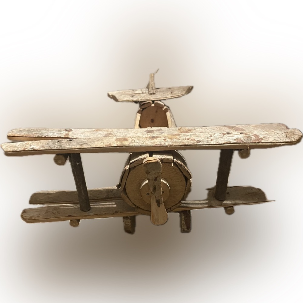 Vintage artibetter plane made of tree limbs